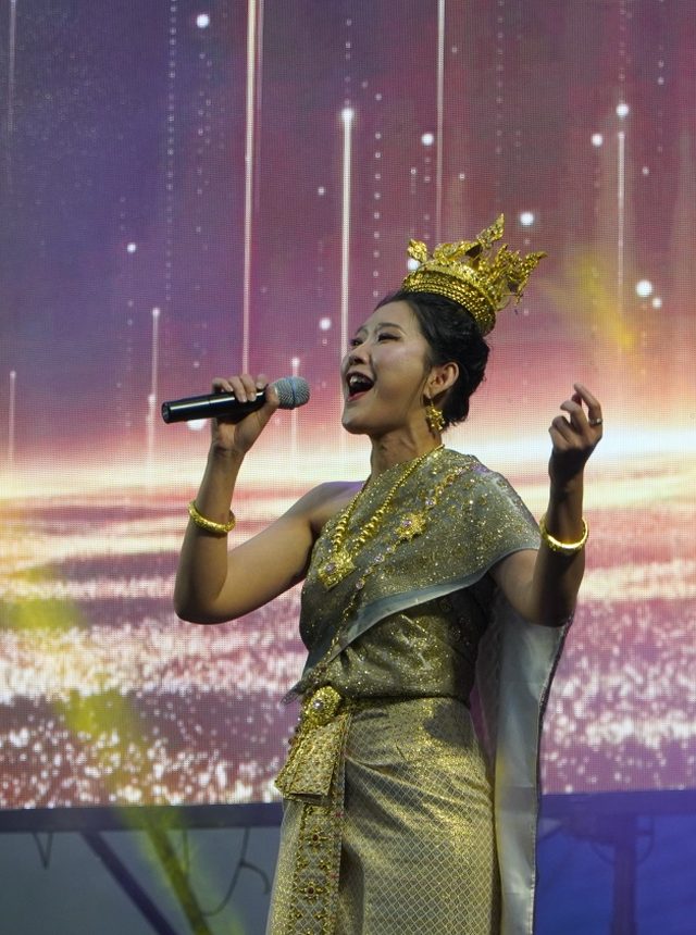 Performer on stage at Asian Festa